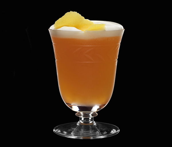 Hummingbird No.1 cocktail: orange coloured liquid with an egg white foam topping