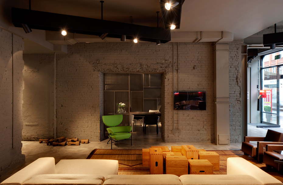 Cassina-London interior, bare painted brick walls, lighting and open-plan spacing