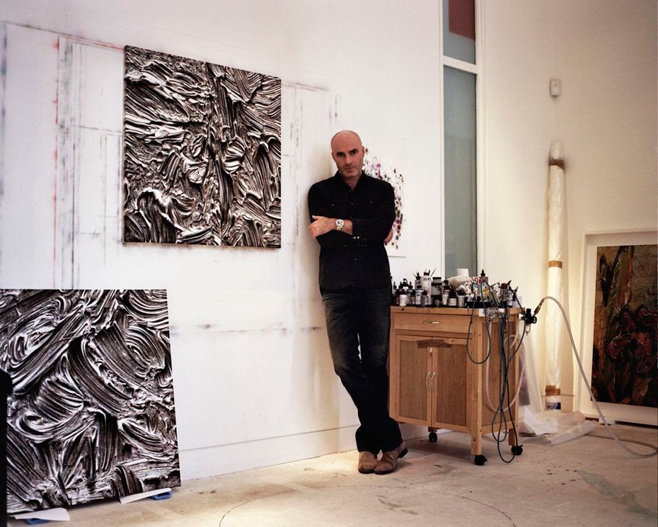 Jason-Brooks-in-front-of-his-paintings,-studio