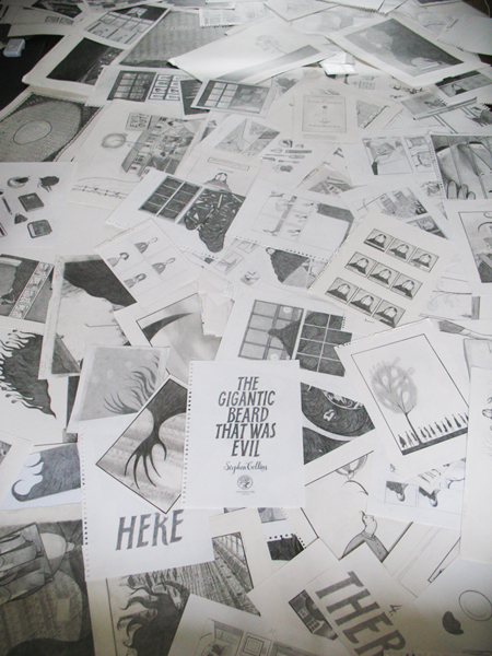 Living room floor covered in illustrations