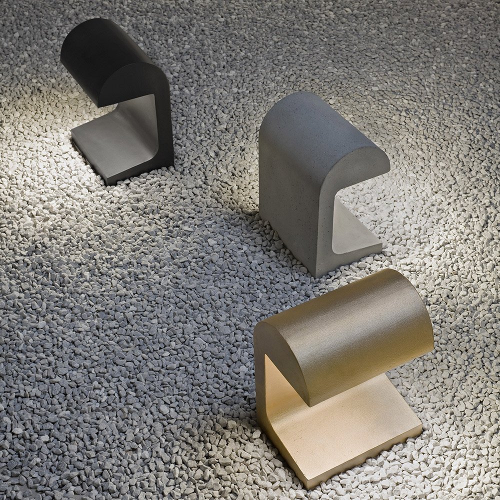 The semi-circular lights from the ‘Casting’ collection are available in oxidised bronze, concrete, cast iron or aluminium