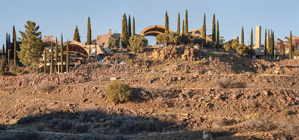 Perched on the edge of a south-facing mesa in central Arizona, more than 7,000 people from around the world have come to build and inhabit the buildings since it was founded in 1970