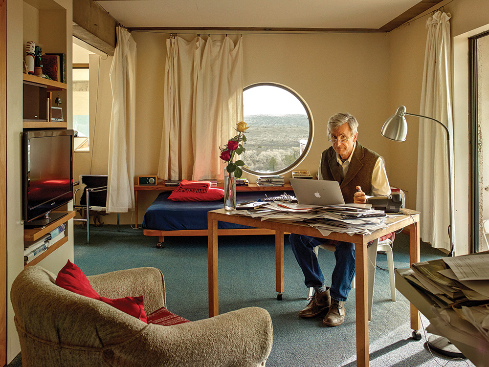 Architect and Cosanti Foundation co-president Jeff Stein working in his apartment in the East Crescent neighbourhood, one level above the main office space at Arcosanti
